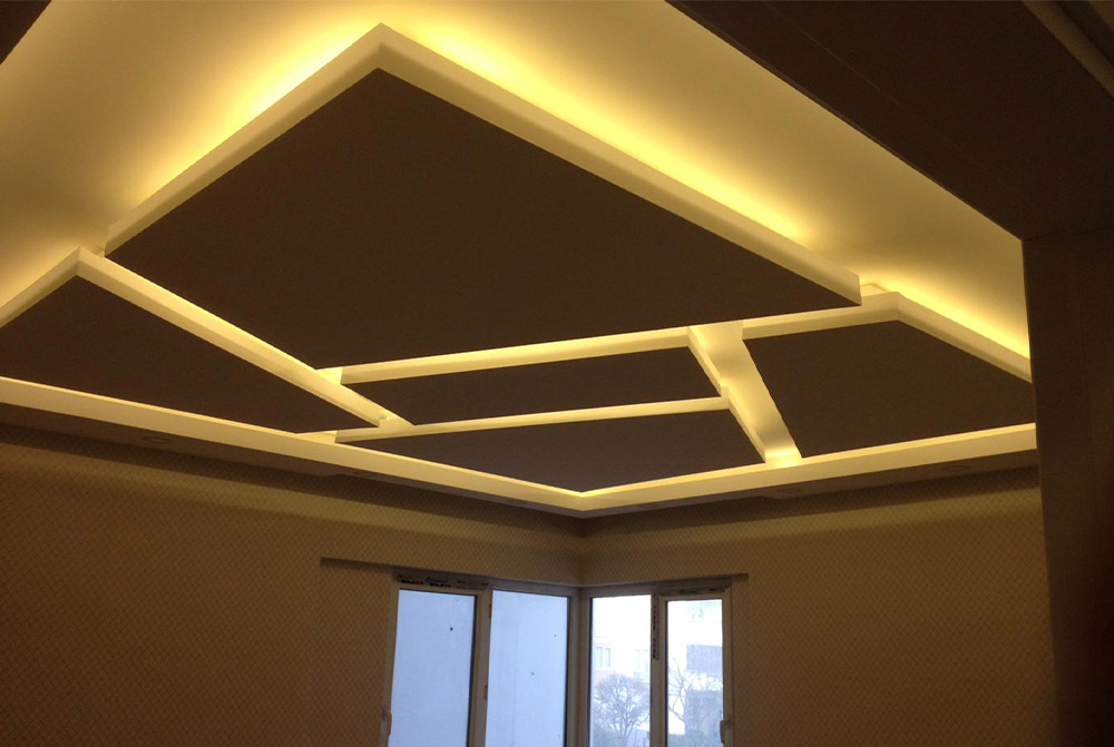 Modern Bathroom Cabinets Installation by Caucasian Worker Modern Stylish Bathroom Cabinets Installation by Professional Caucasian Worker. House Interior Furnishing.